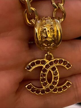 Absolutely stunning fashionable , collectible Chanel authentic golden necklace